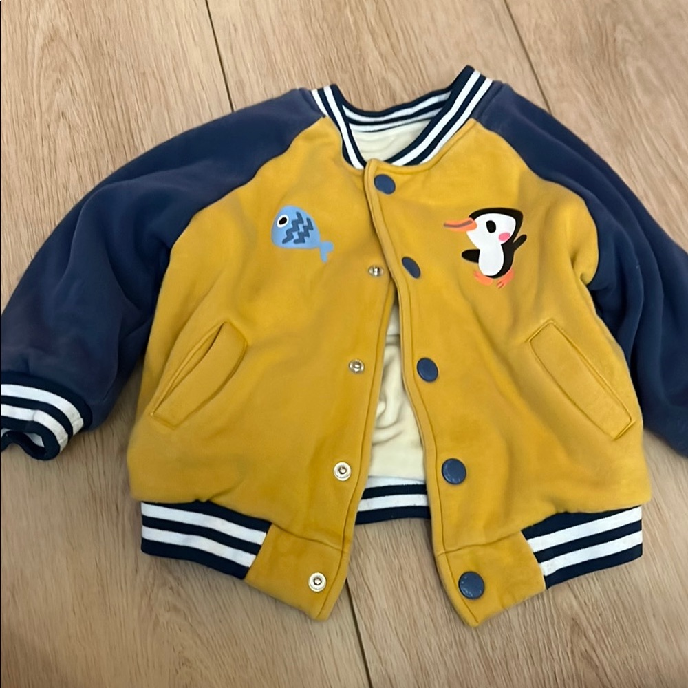 Sporty Yellow and Blue Puffer Jacket with Striped Accents